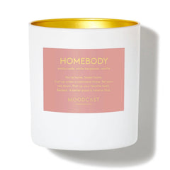 Luxury scented candle with smoky cade, vanilla, amber, and white bergamot