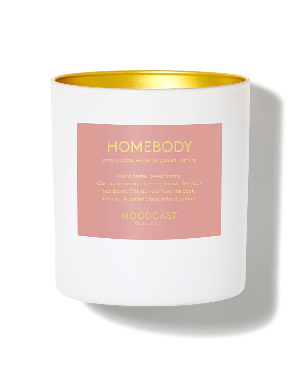 Luxury scented candle with smoky cade, vanilla, amber, and white bergamot