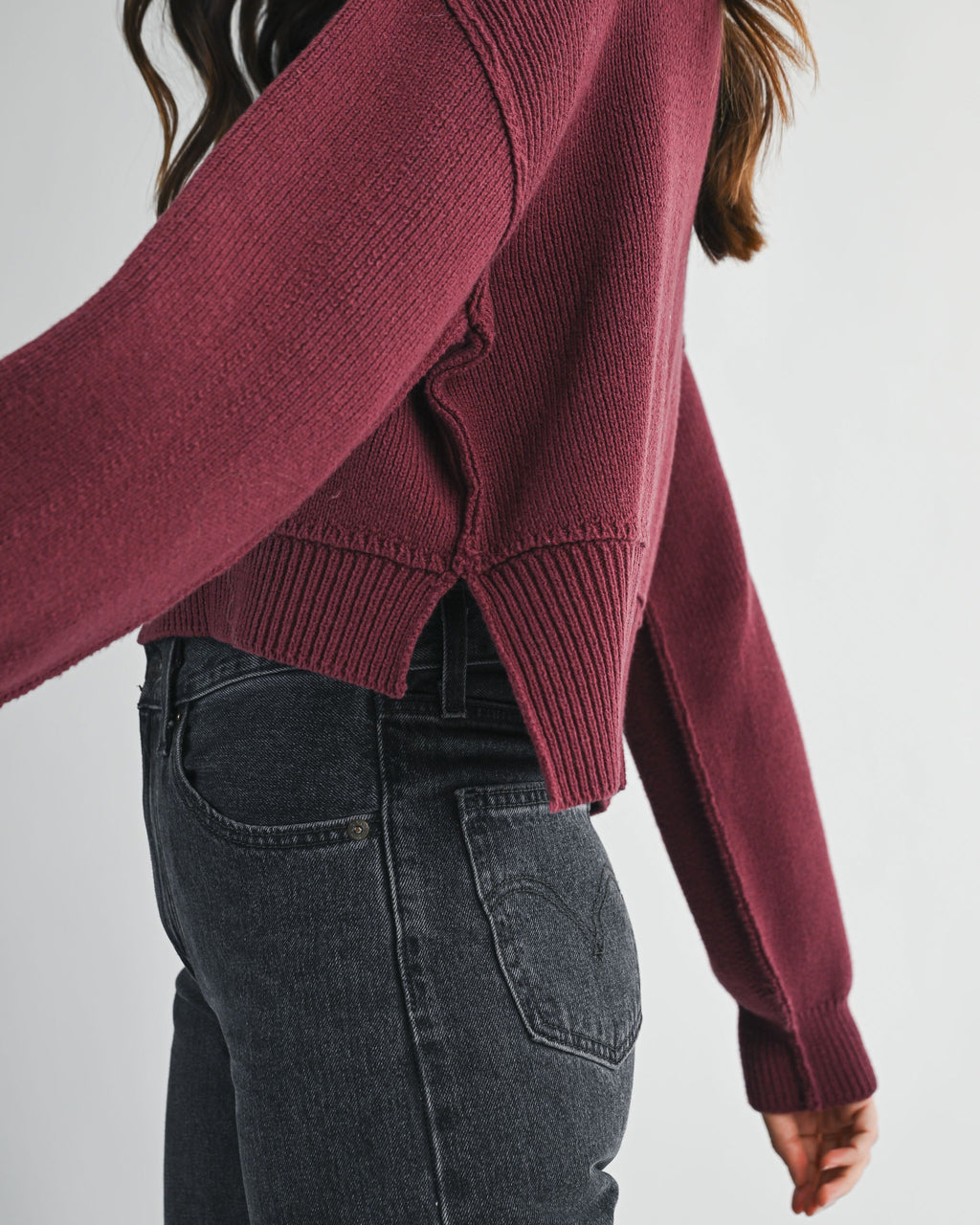 women’s crew neck cropped sweater with side slit detail in wine color