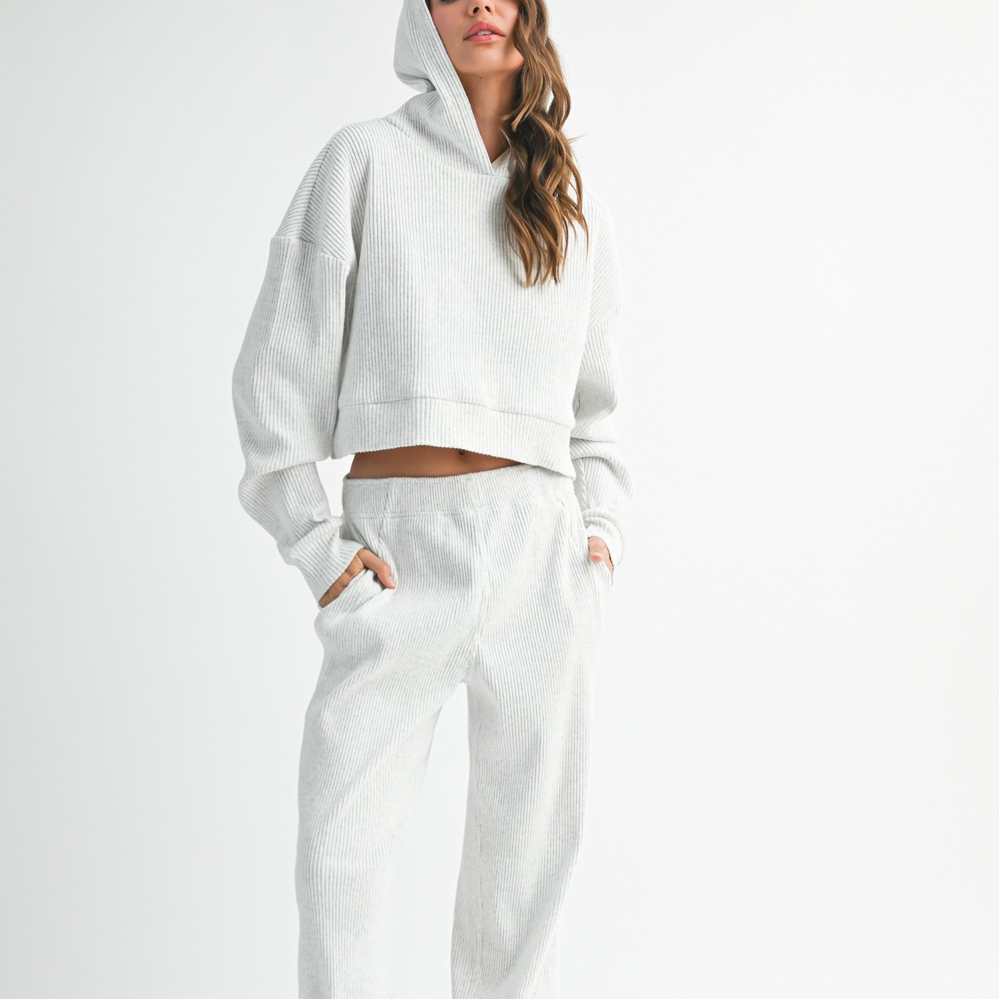 white cropped sweatshirt styled with joggers