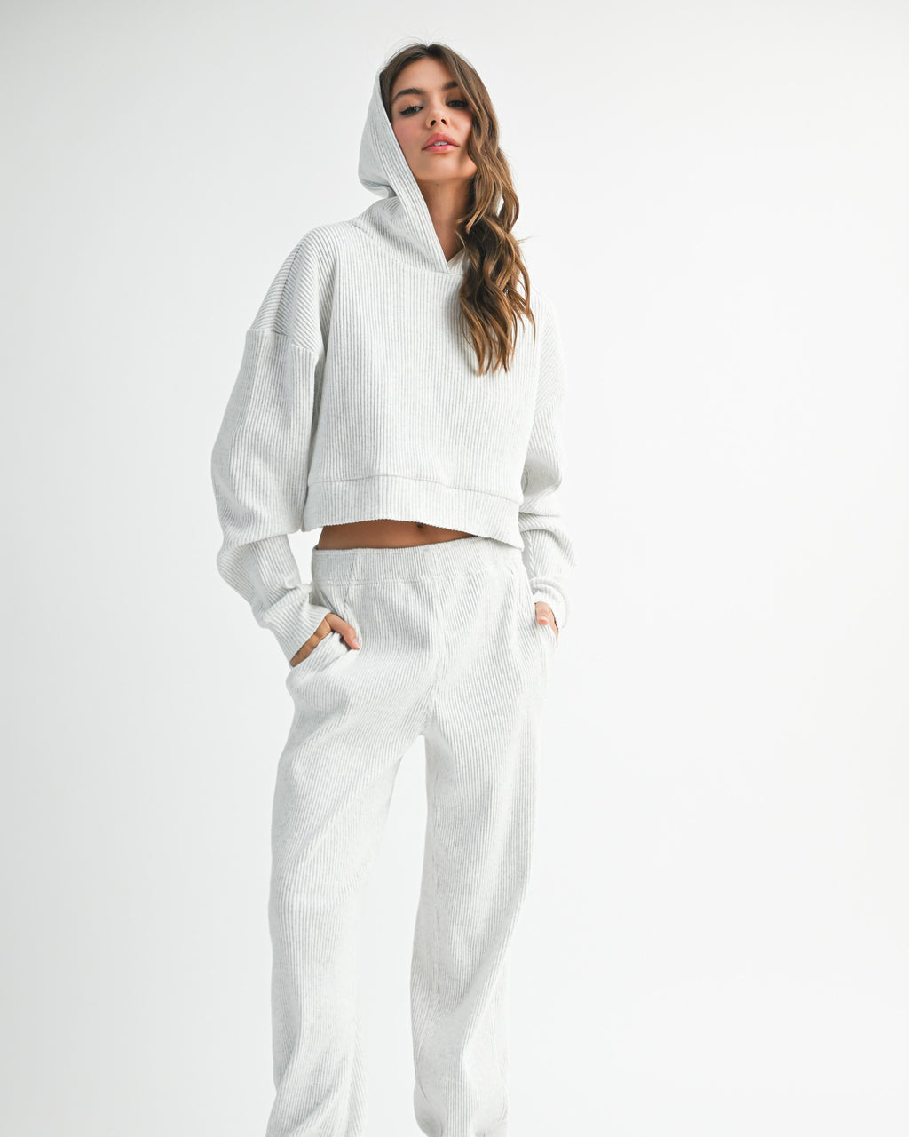 white cropped sweatshirt styled with joggers