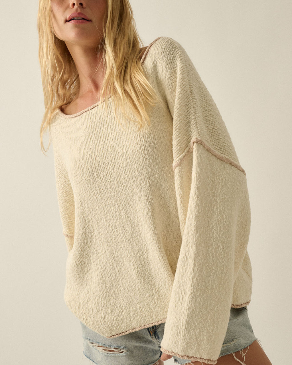 Women’s relaxed fit knit sweater with contrast seams