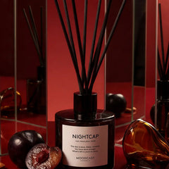 Luxury Nightcap reed diffuser with dark rum, black plum, and tonka fragrance