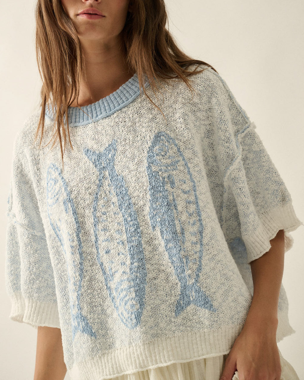 Lightweight jacquard knit sweater with fish design, relaxed fit and short sleeves for women