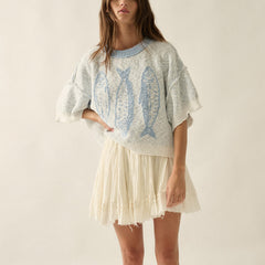 Lightweight jacquard knit sweater with fish design, relaxed fit and short sleeves for women